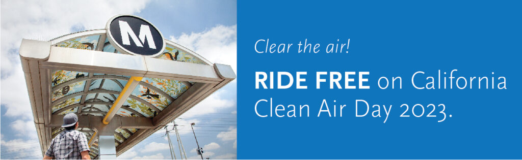 Patron looking up at the Metro station shelter overhang.